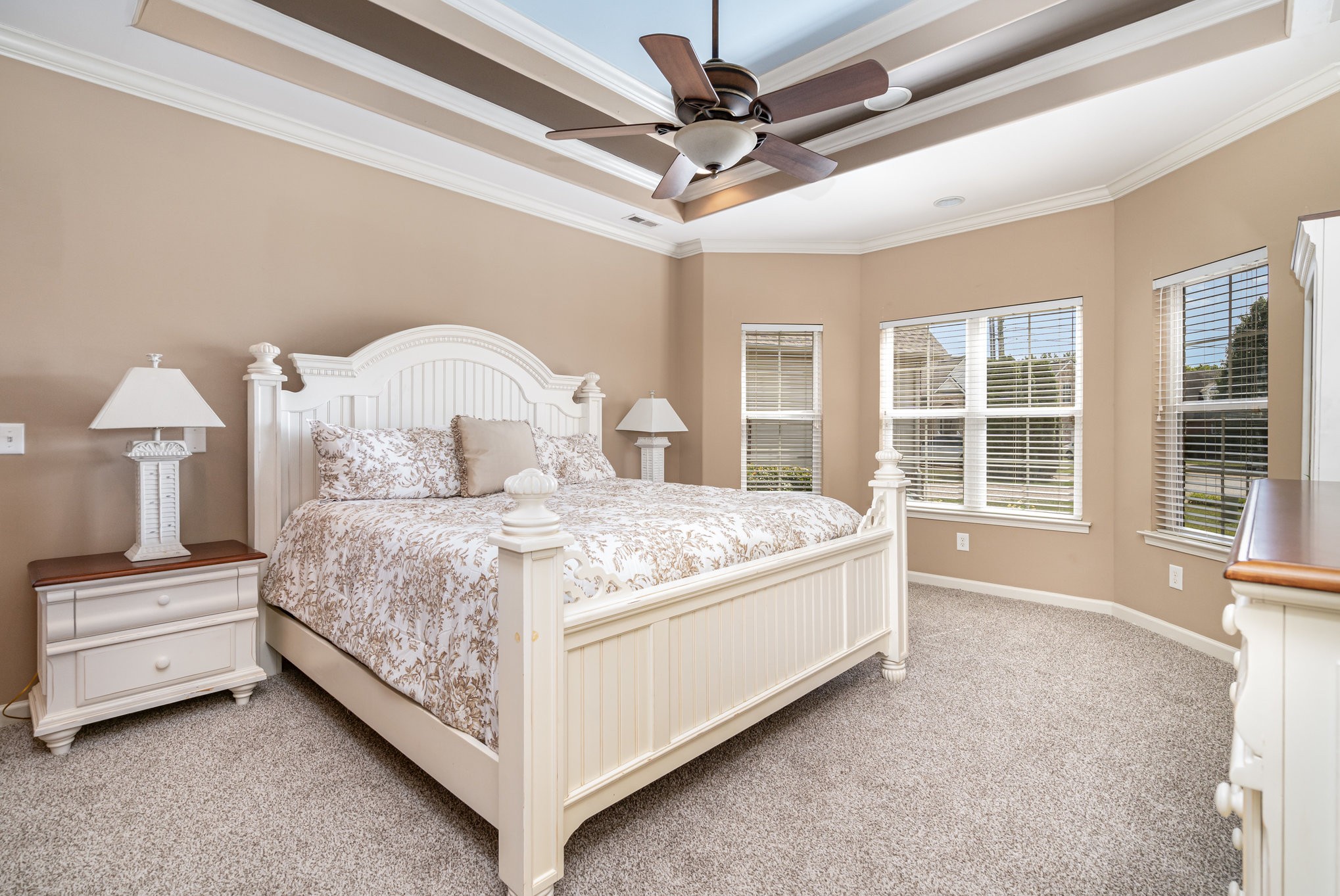 6015 Warner Court Spring Hill, TN 37174 - Photo 14 of 35 a bedroom with a large bed and a chandelier