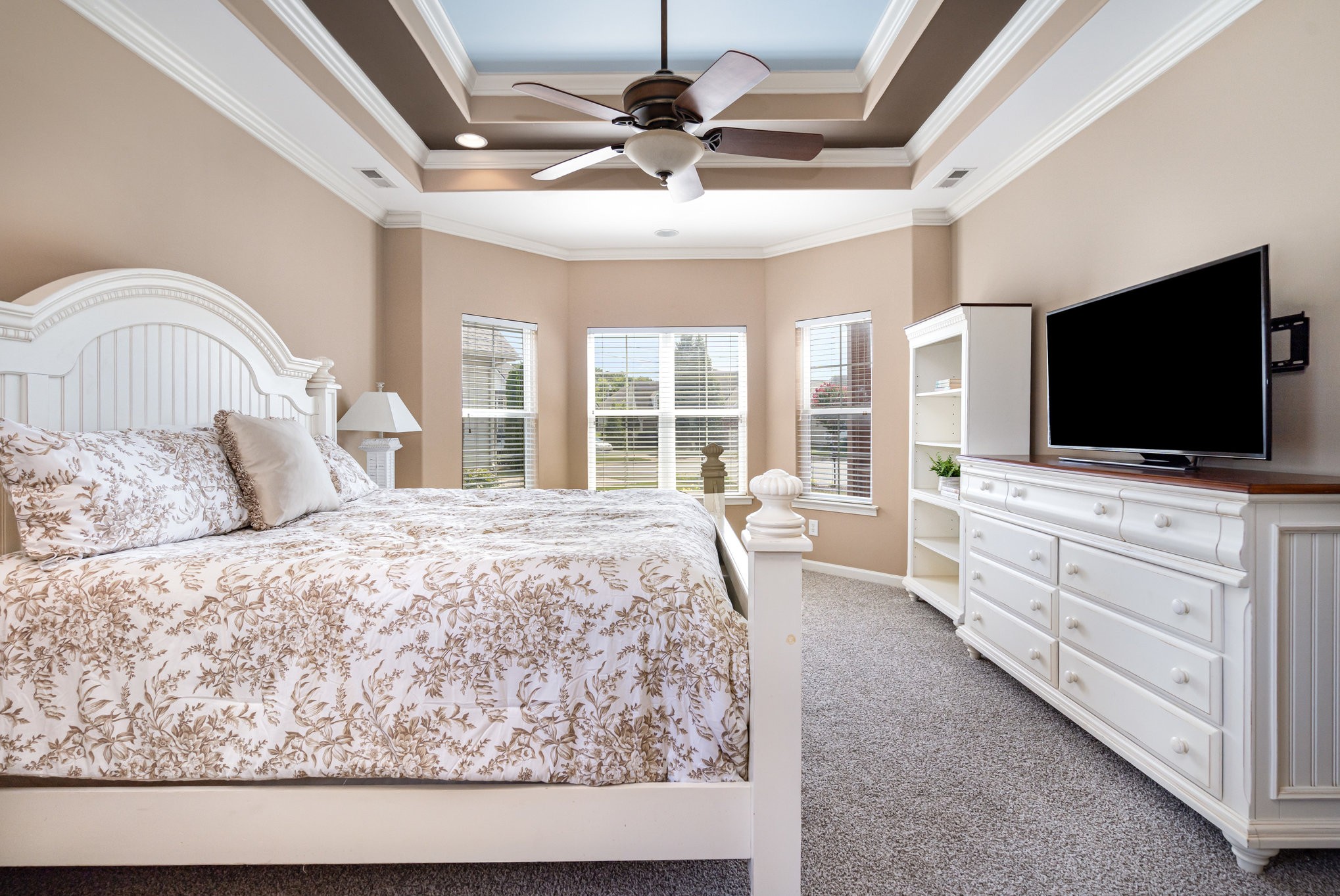 6015 Warner Court Spring Hill, TN 37174 - Photo 15 of 35 a bedroom with a bed and a flat screen tv