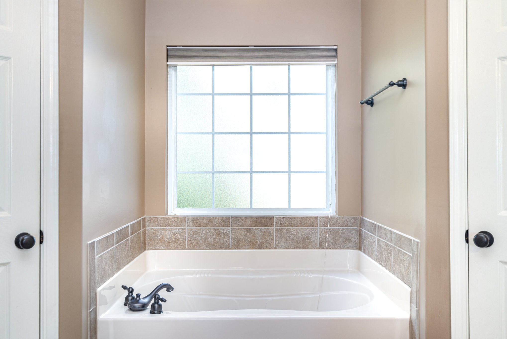 6015 Warner Court Spring Hill, TN 37174 - Photo 17 of 35 a white bath tub sitting next to a window