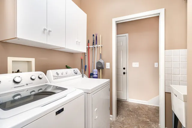 a utility room with dryer and washer