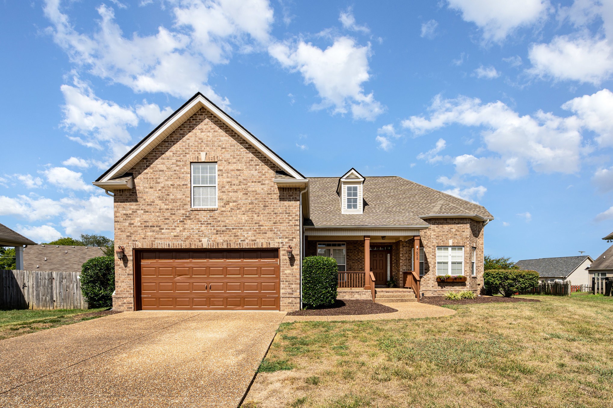 6015 Warner Court Spring Hill, TN 37174 - Photo 35 of 35 a front view of a house with a yard and garage