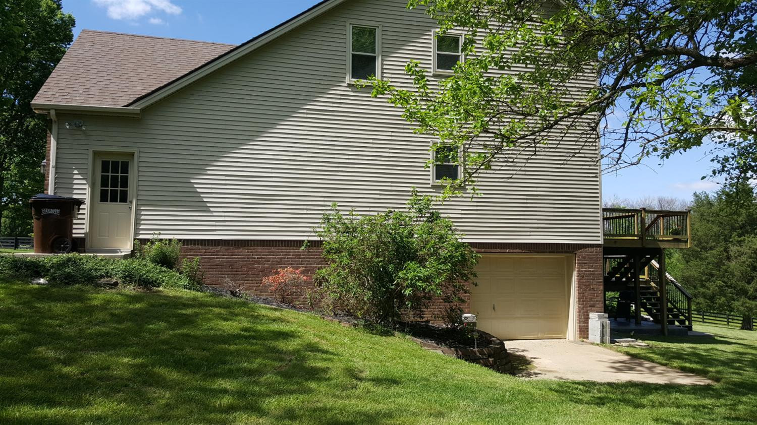 475 Cedar Lake Road Versailles, KY 40383 - Photo 15 of 57 One car garage around the side of the ho