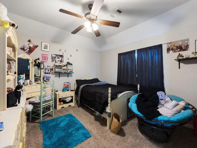 a bathroom with a sink double vanity and a mirror