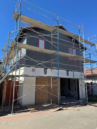 a view of a garage with wooden wall