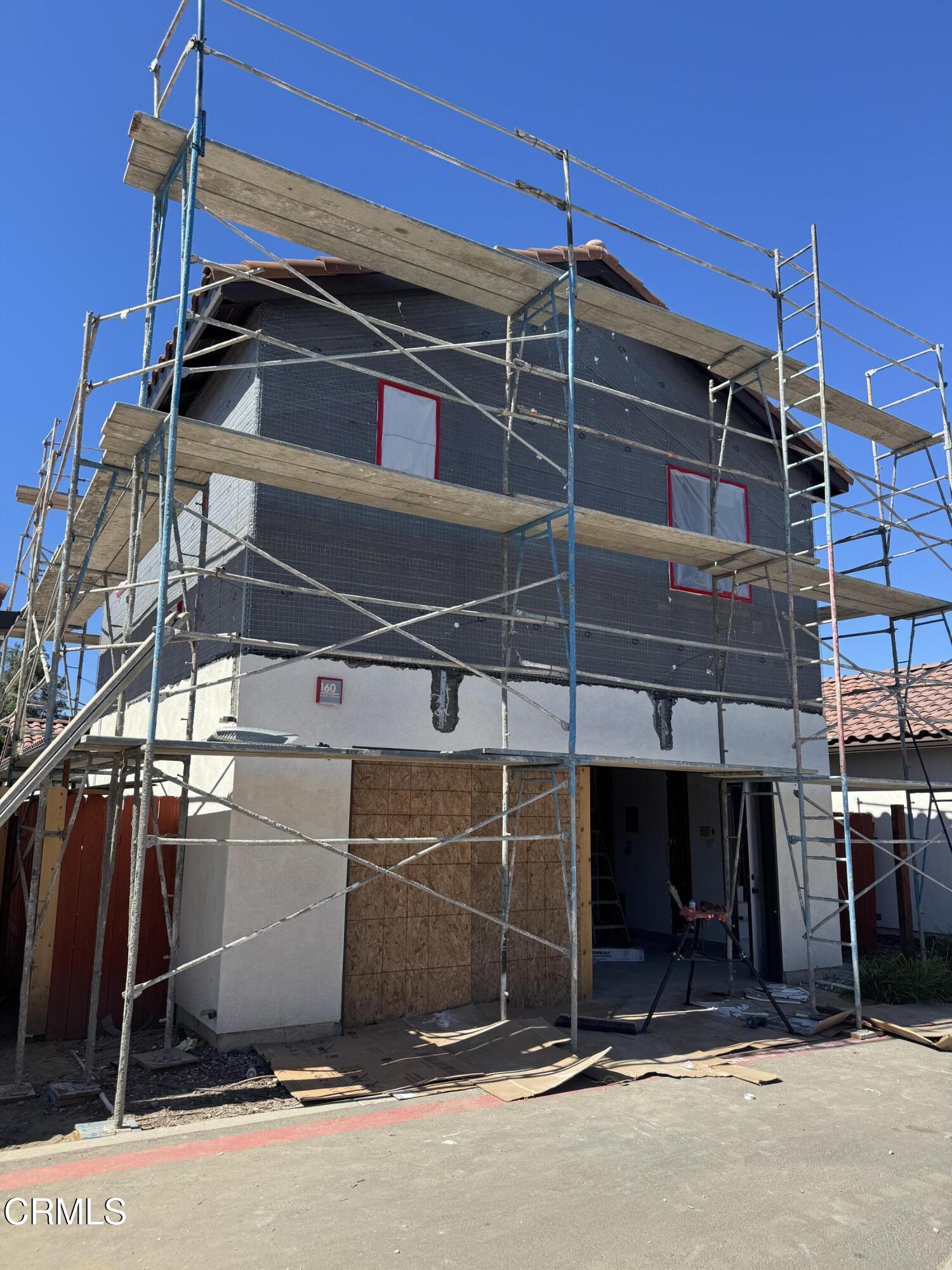 160 South K Street, Unit A Oxnard, CA 93030 - Photo 3 of 7 a view of a garage with wooden wall
