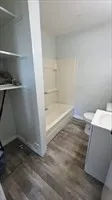 a view of storage and utility room with washer and dryer