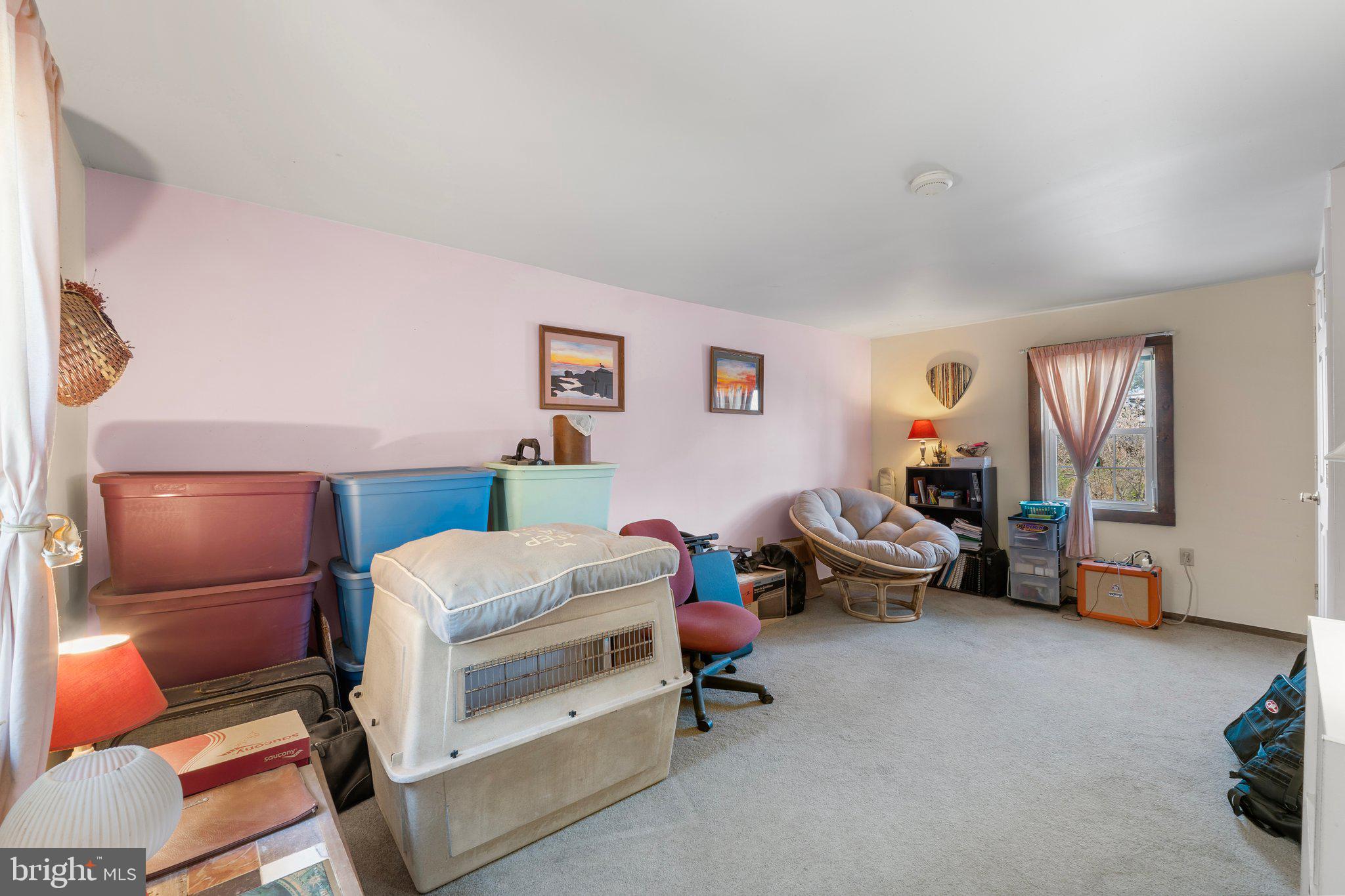 15921 Frederick Road Woodbine, MD 21797 - Photo 26 of 41 Spacious room with soft pastel hues.