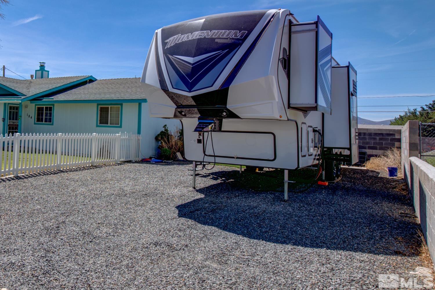 184 Ring Road Dayton, NV 89403 - Photo 34 of 40 a view of house with a yard