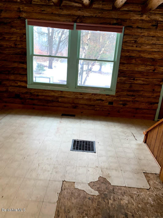 376 Polikoff Road Sheffield, MA 01222 - Photo 4 of 23 a view of an empty room with a window
