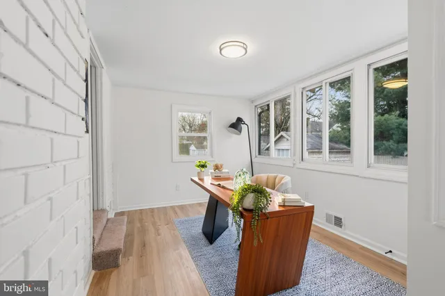 a living room with furniture and window