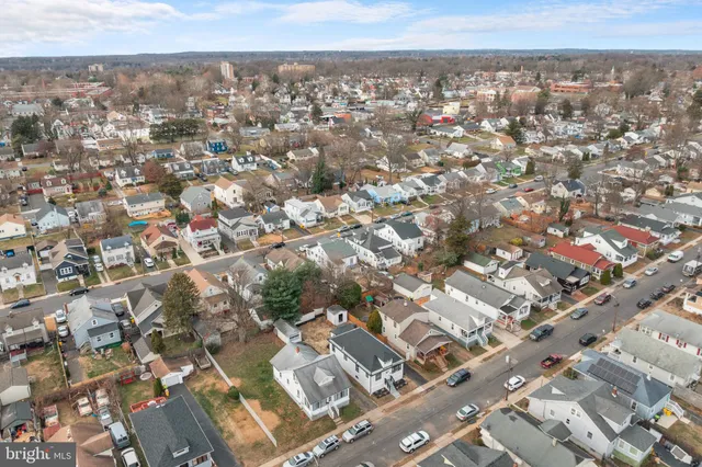 an aerial view of residential building with parking space
