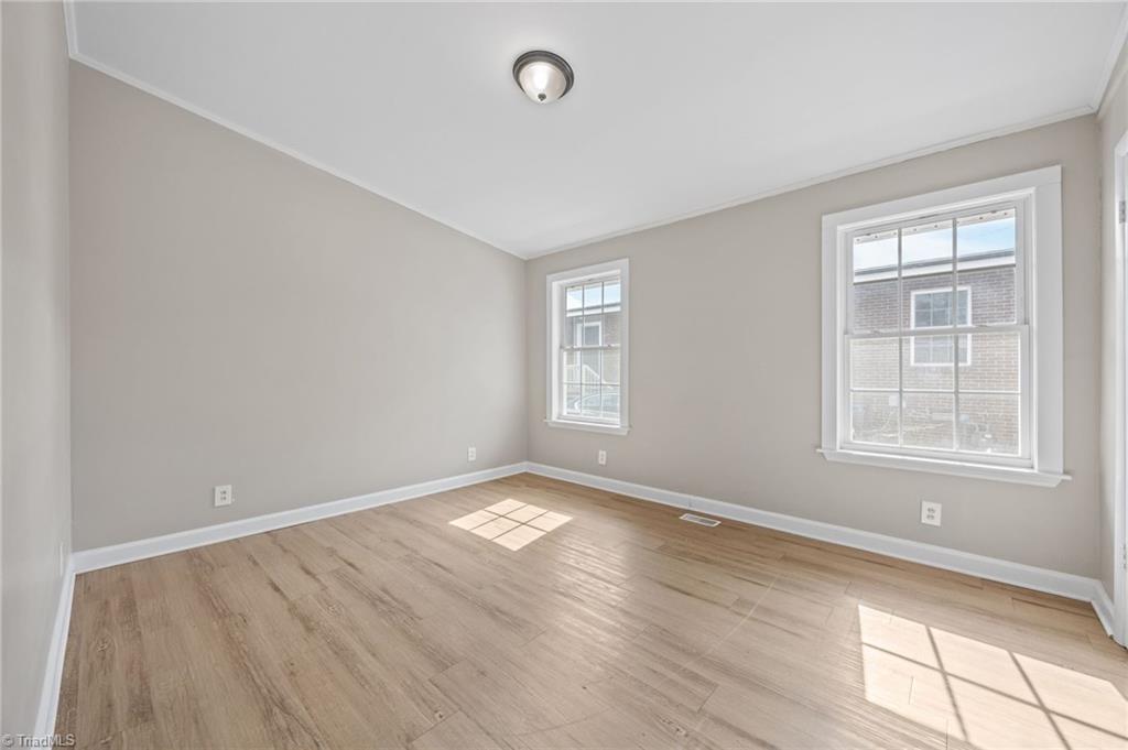 511 Saunders Place, Unit A & B High Point, NC 27260 - Photo 10 of 29 Second bedroom with two big windows that fills the room with natural light at Unit B.