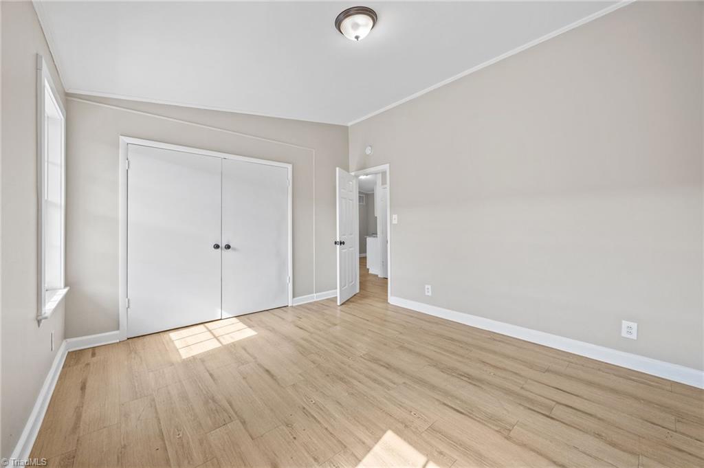 511 Saunders Place, Unit A & B High Point, NC 27260 - Photo 23 of 29 Second bedroom with ample closet storage.