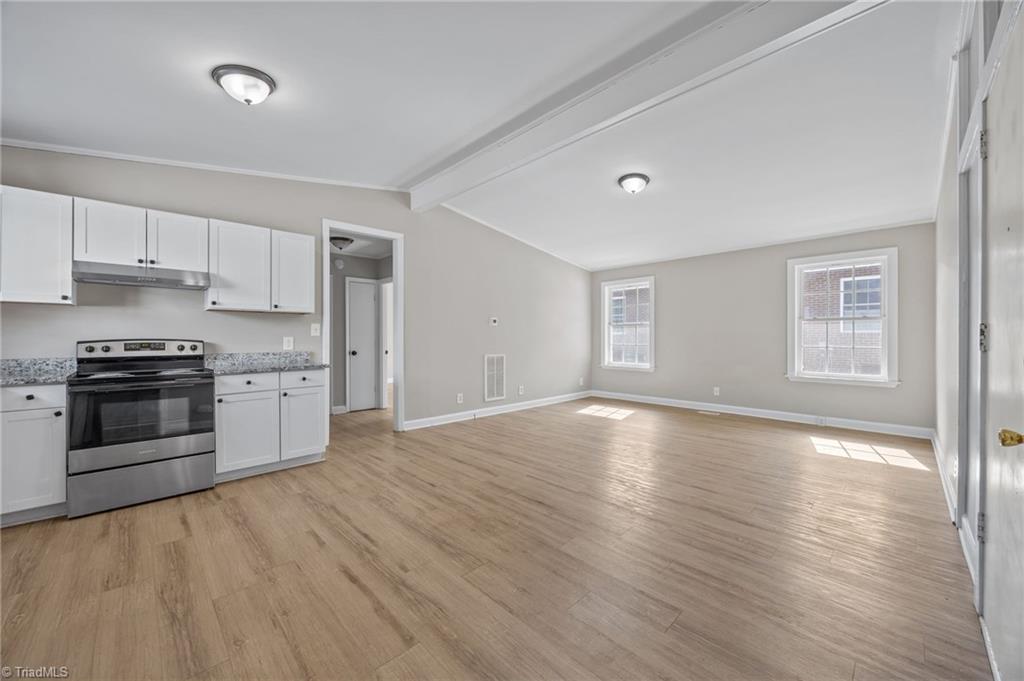 511 Saunders Place, Unit A & B High Point, NC 27260 - Photo 3 of 29 Unit B-Open living space to the kitchen of the home.