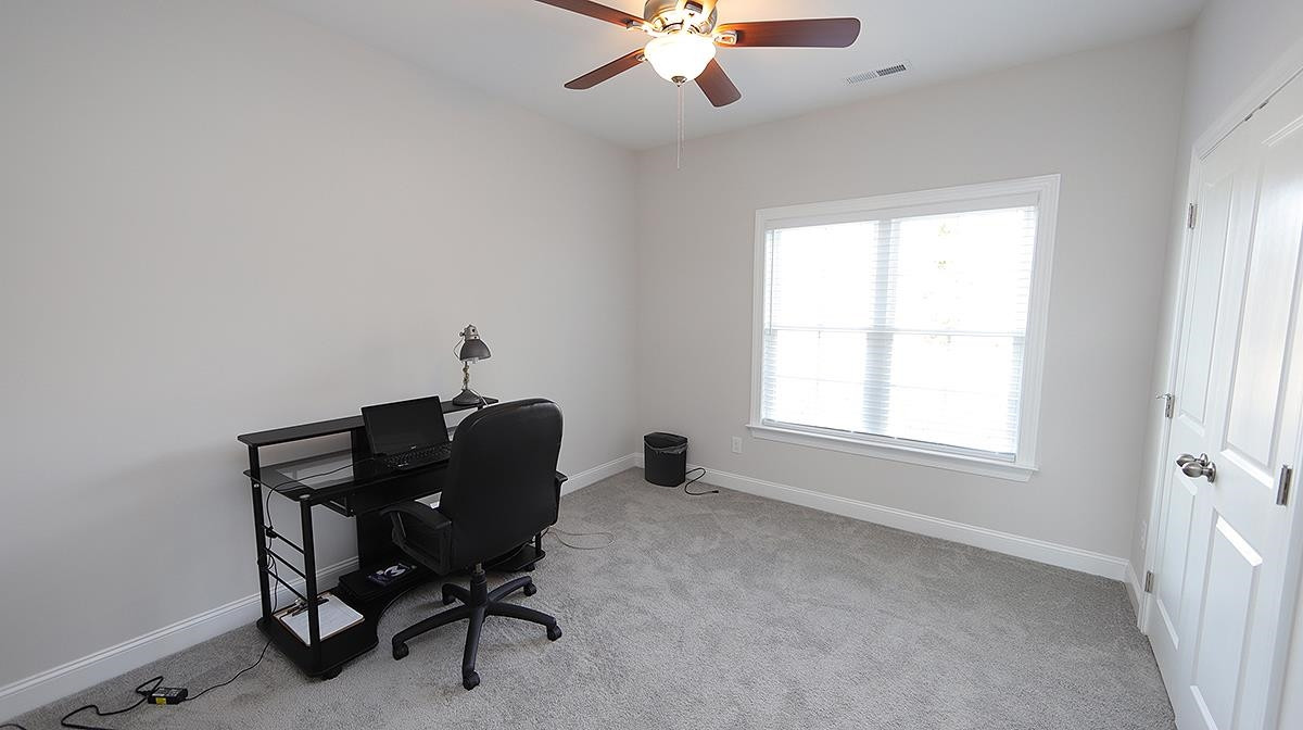 4007 Needham Road Bailey, NC 27807 - Photo 17 of 22 This bedroom is being used as an office right now. Third Bedroom