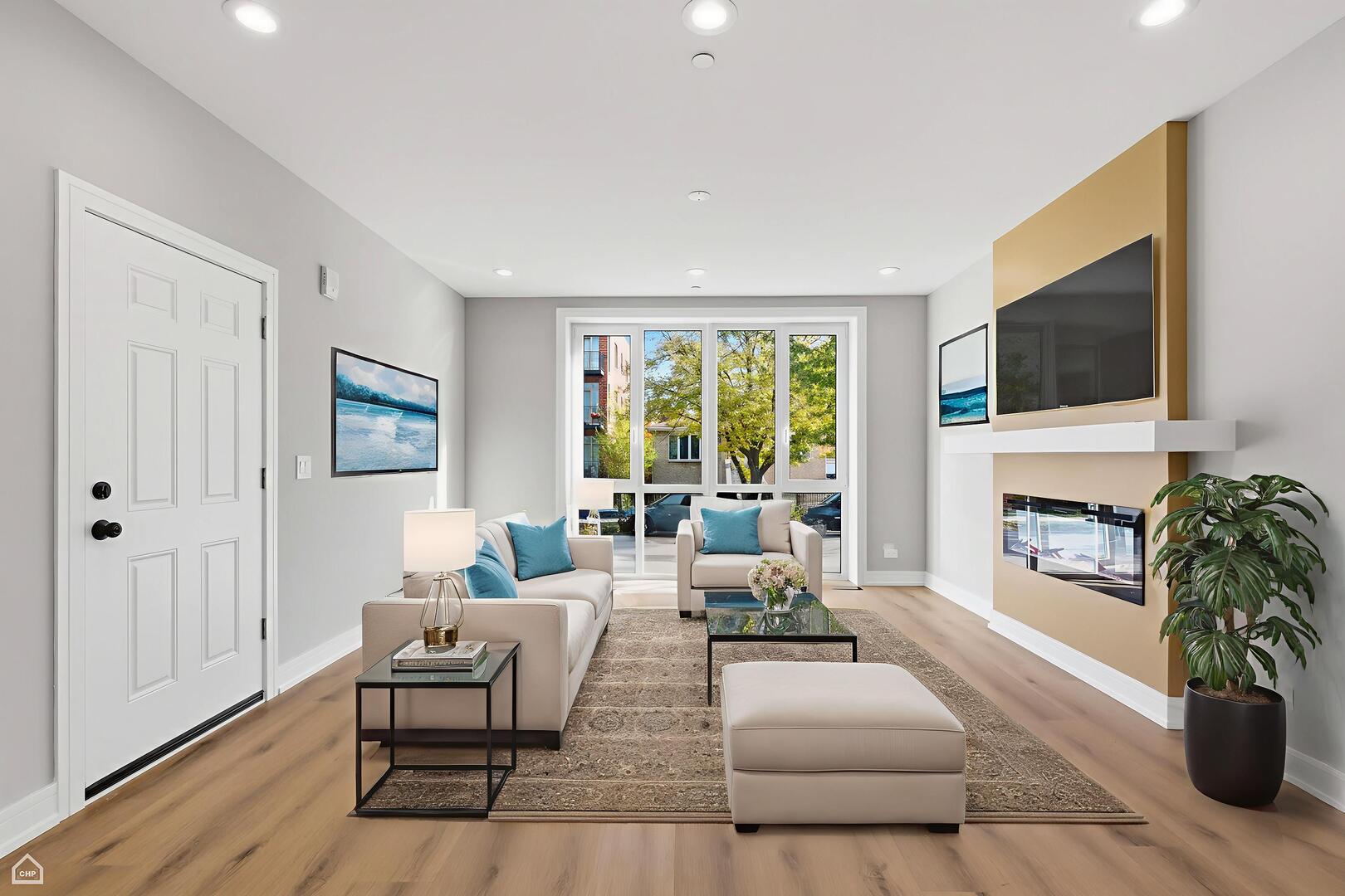 2718 Budd Street River Grove, IL 60171 - Photo 44 of 145 a living room with fireplace furniture and a flat screen tv