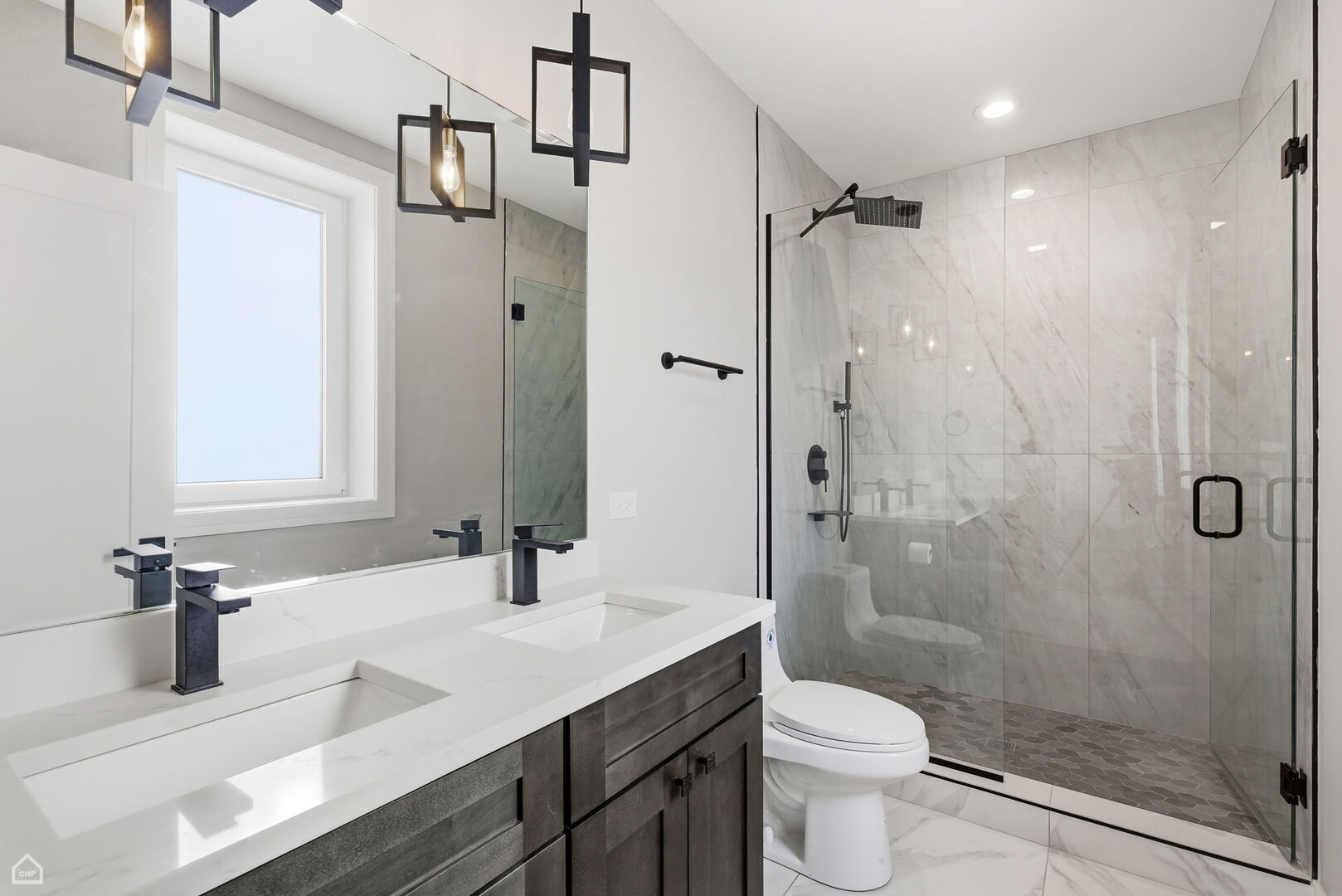 2718 Budd Street River Grove, IL 60171 - Photo 67 of 145 a bathroom with a sink a toilet and shower