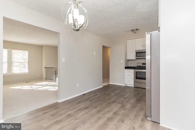 a view of a kitchen with a sink cabinets and window