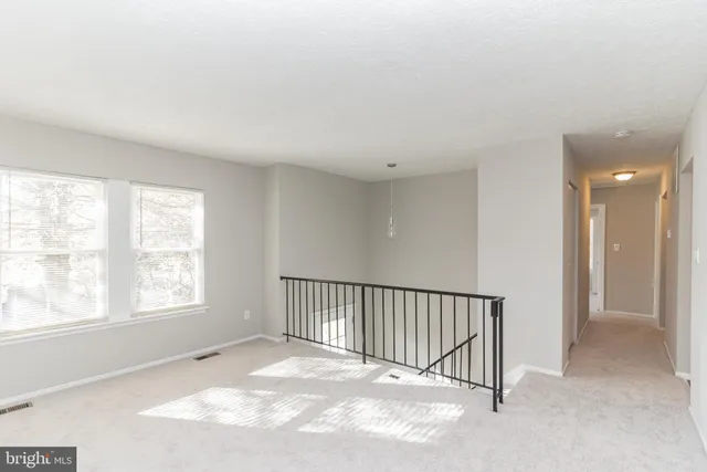a view of a livingroom with a staircase