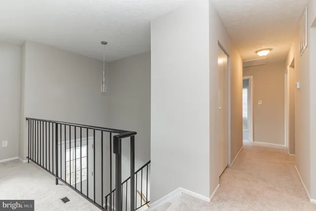 a view of hallway with stairs