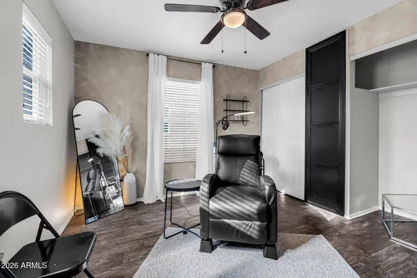 a living room with furniture and a window