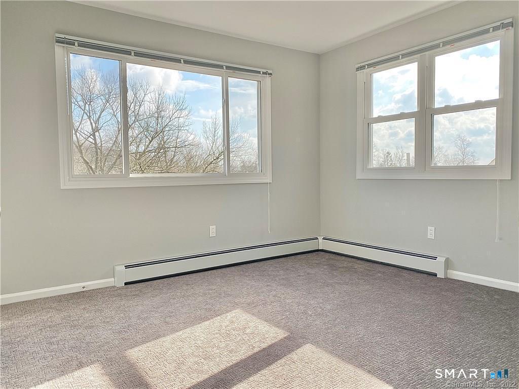 35 Ojibwa Road, Unit A Shelton, CT 06484 - Photo 7 of 8 a view of an empty room with a window