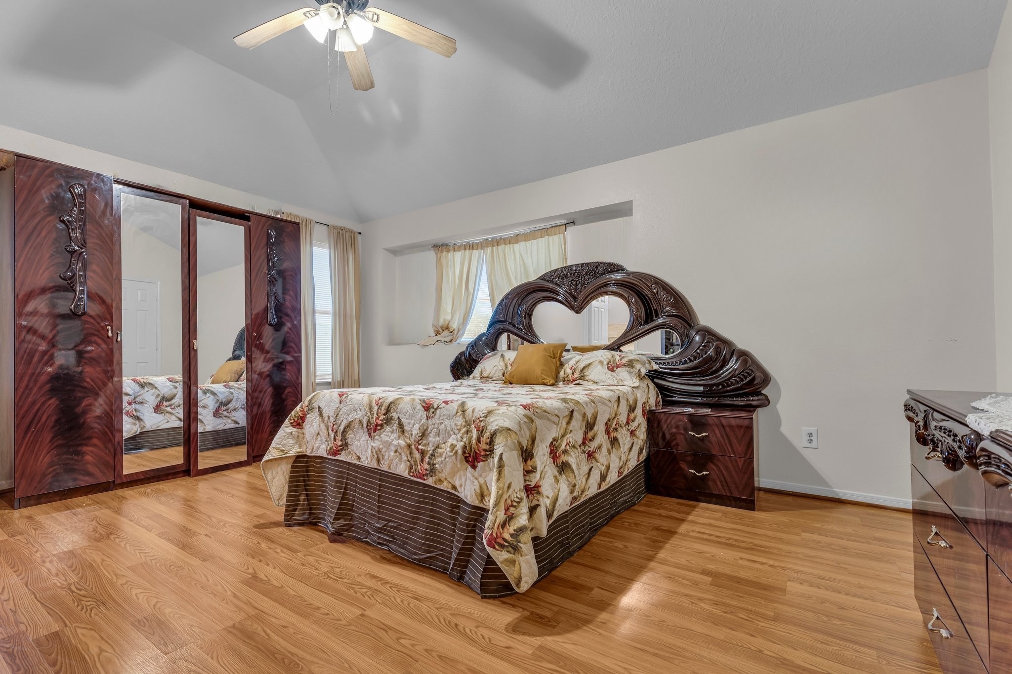 1130 Fairlane Square Channelview, TX 77530 - Photo 16 of 22 a bedroom with a bed and a large window with wooden floor