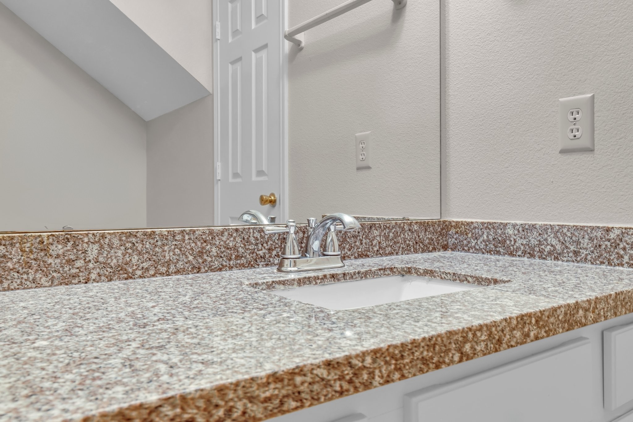 1130 Fairlane Square Channelview, TX 77530 - Photo 9 of 22 a bathroom with a granite countertop sink and a mirror