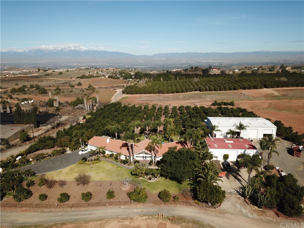 17850 Vista Del Lago Drive Riverside, CA 92503 - Photo 42 of 43 an aerial view of a city with lots of residential buildings ocean and mountain view in back