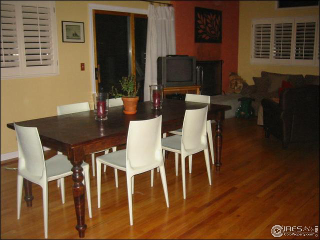 7140 Olde Stage Road Boulder, CO 80302 - Photo 4 of 12 a view of a dining room with furniture window and wooden floor