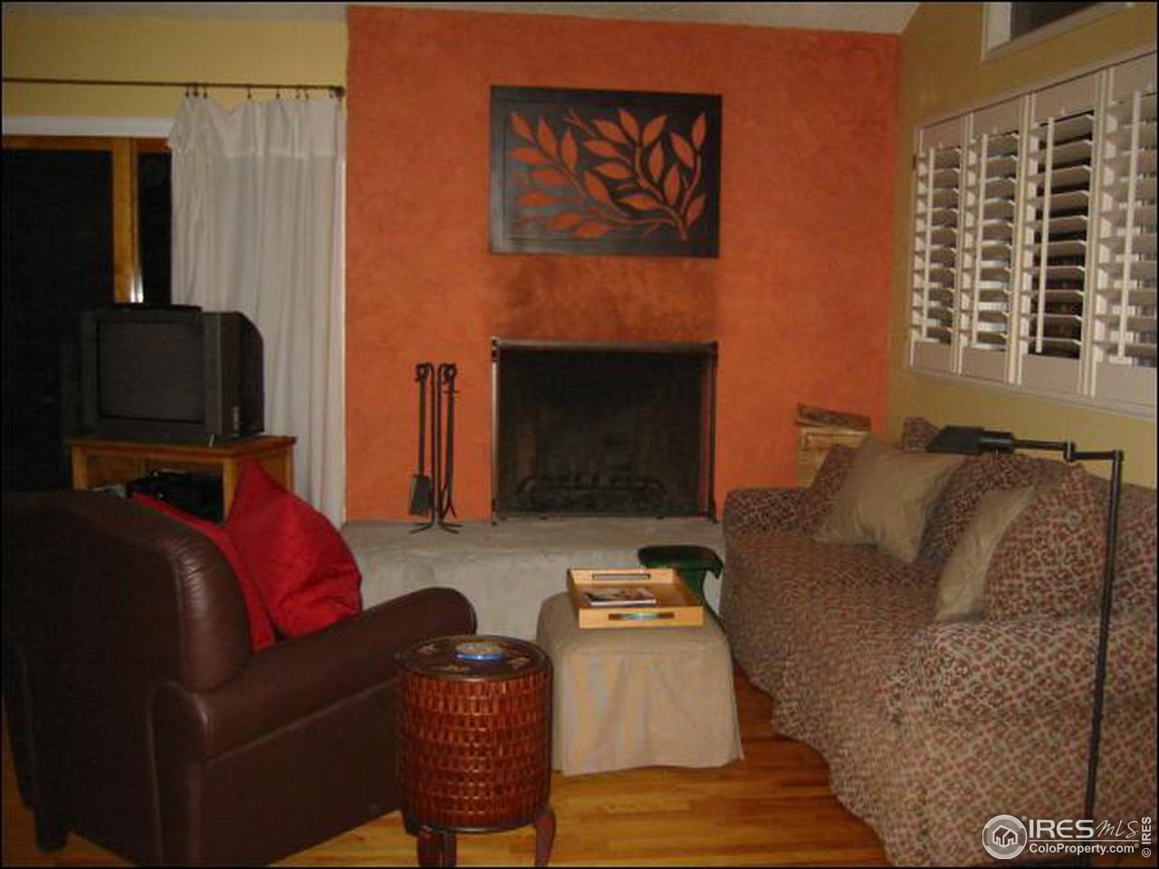 7140 Olde Stage Road Boulder, CO 80302 - Photo 5 of 12 a living room with furniture and a fireplace