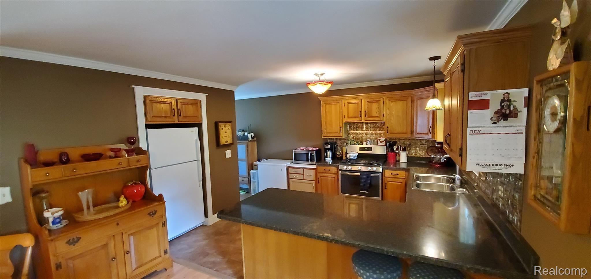7210 North Gregory Road Fowlerville, MI 48836 - Photo 2 of 38 20190701_151407.jpg