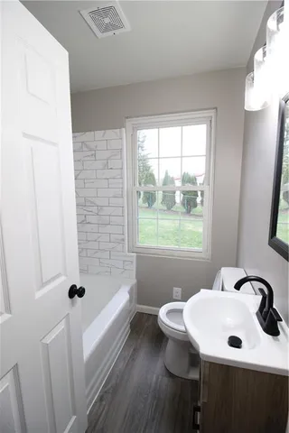 a bathroom with a sink and a bathtub