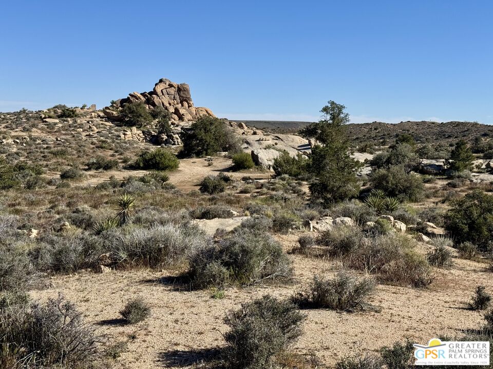 900 Parson Ranch Road Landers, CA 92285 - Photo 8 of 14 a view of a mountain view with mountains in the background