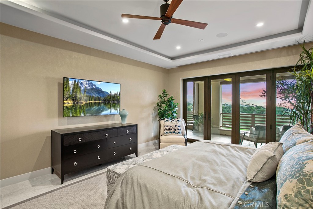 6 Monarch Beach Resort North Dana Point, CA 92629 - Photo 20 of 47 a bedroom with a bed and a flat screen tv