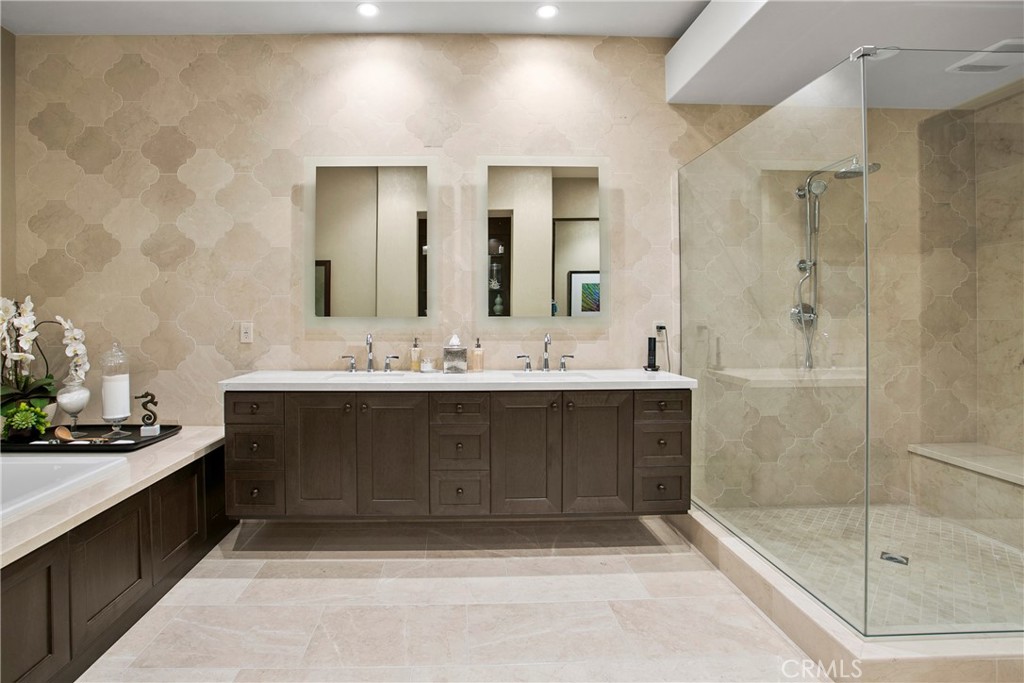 6 Monarch Beach Resort North Dana Point, CA 92629 - Photo 22 of 47 a bathroom with a sink and a mirror