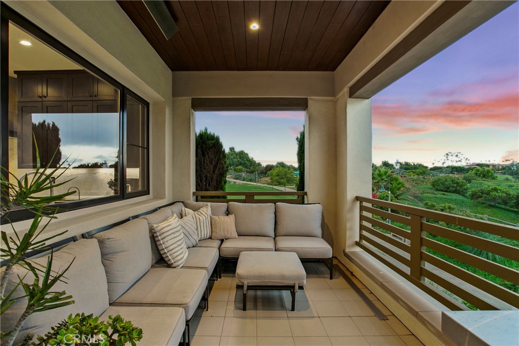 6 Monarch Beach Resort North Dana Point, CA 92629 - Photo 33 of 47 a balcony with furniture and a potted plant