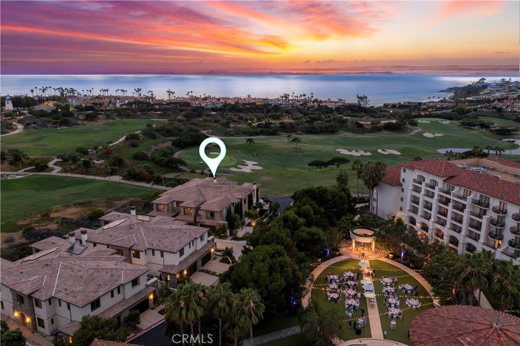 6 Monarch Beach Resort North Dana Point, CA 92629 - Photo 46 of 47 an aerial view of a house with a garden and lake view
