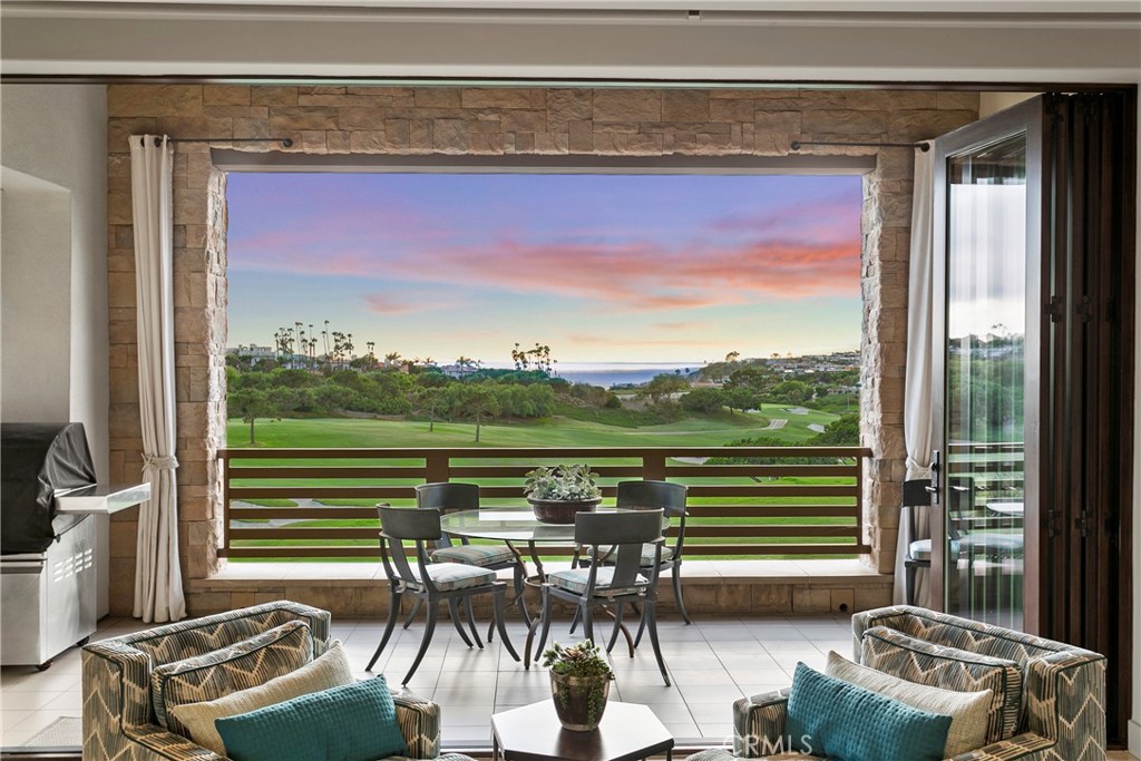 6 Monarch Beach Resort North Dana Point, CA 92629 - Photo 9 of 47 a view of a living room and dining room with furniture window and outside view