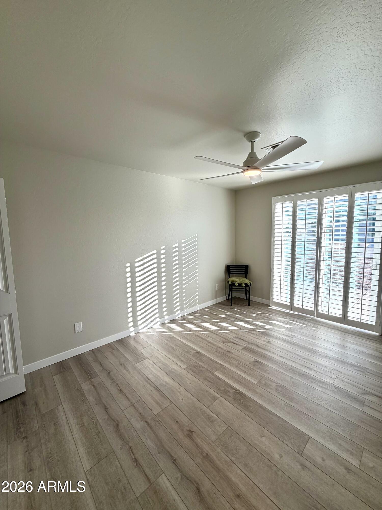 1165 North Mountain View Road Apache Junction, AZ 85119 - Photo 16 of 29 a view of a livingroom with a staircase