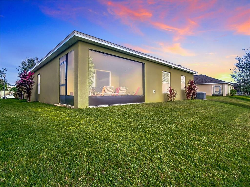 1300 Cavender Creek Road Minneola, FL 34715 - Photo 19 of 28 a front view of house with garden