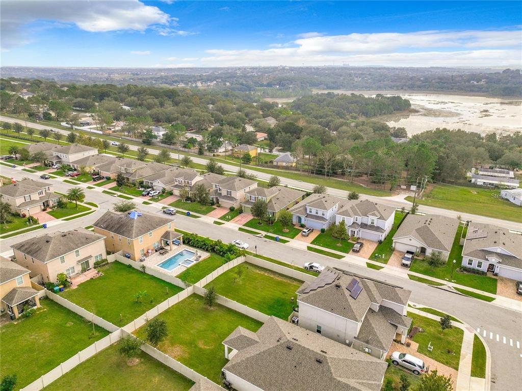 1300 Cavender Creek Road Minneola, FL 34715 - Photo 27 of 28 an aerial view of a house with a ocean view