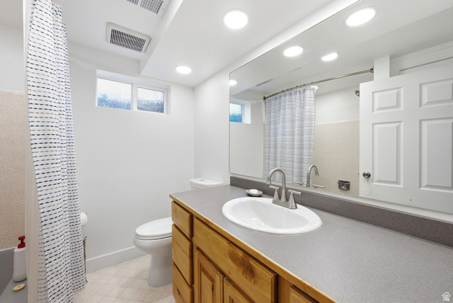 120 North 1230 E Street Springville, UT 84663 - Photo 29 of 60 Bathroom featuring a wood-finish vanity with an integrated sink and a large wall-mounted mirror