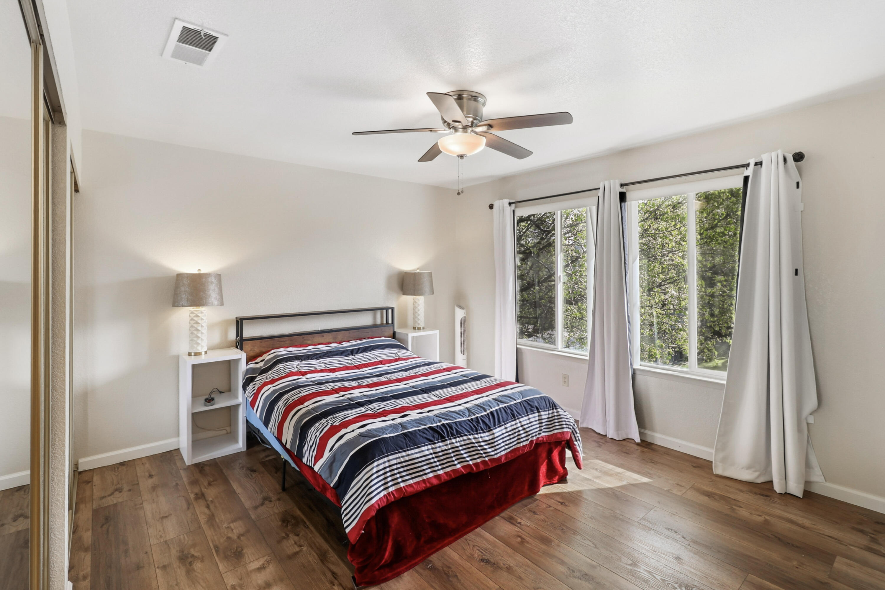 200 Ridgetop Drive, Unit 31 Redding, CA 96003 - Photo 18 of 34 a bedroom with a bed and window