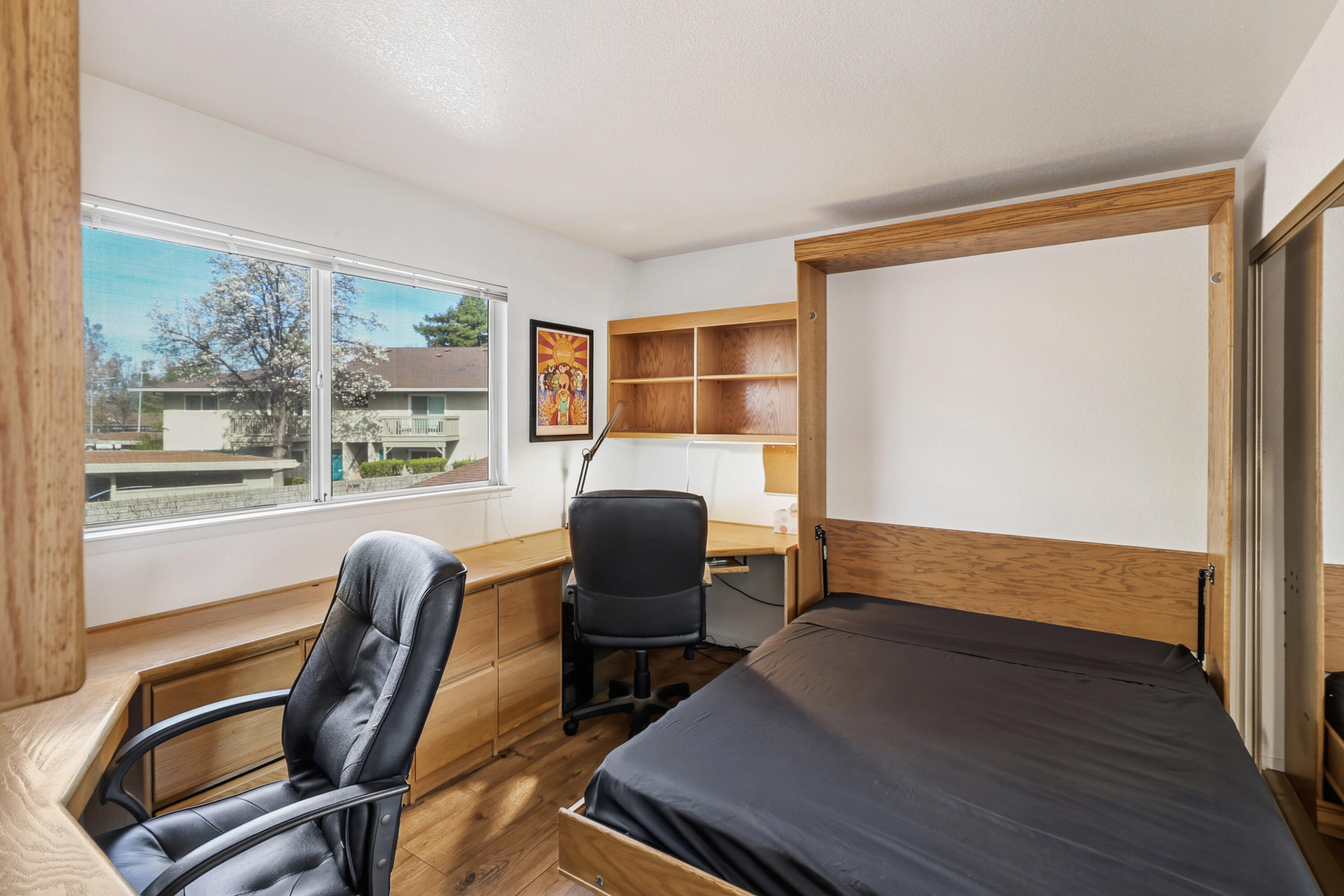 200 Ridgetop Drive, Unit 31 Redding, CA 96003 - Photo 22 of 34 a view of a workspace with furniture and a window