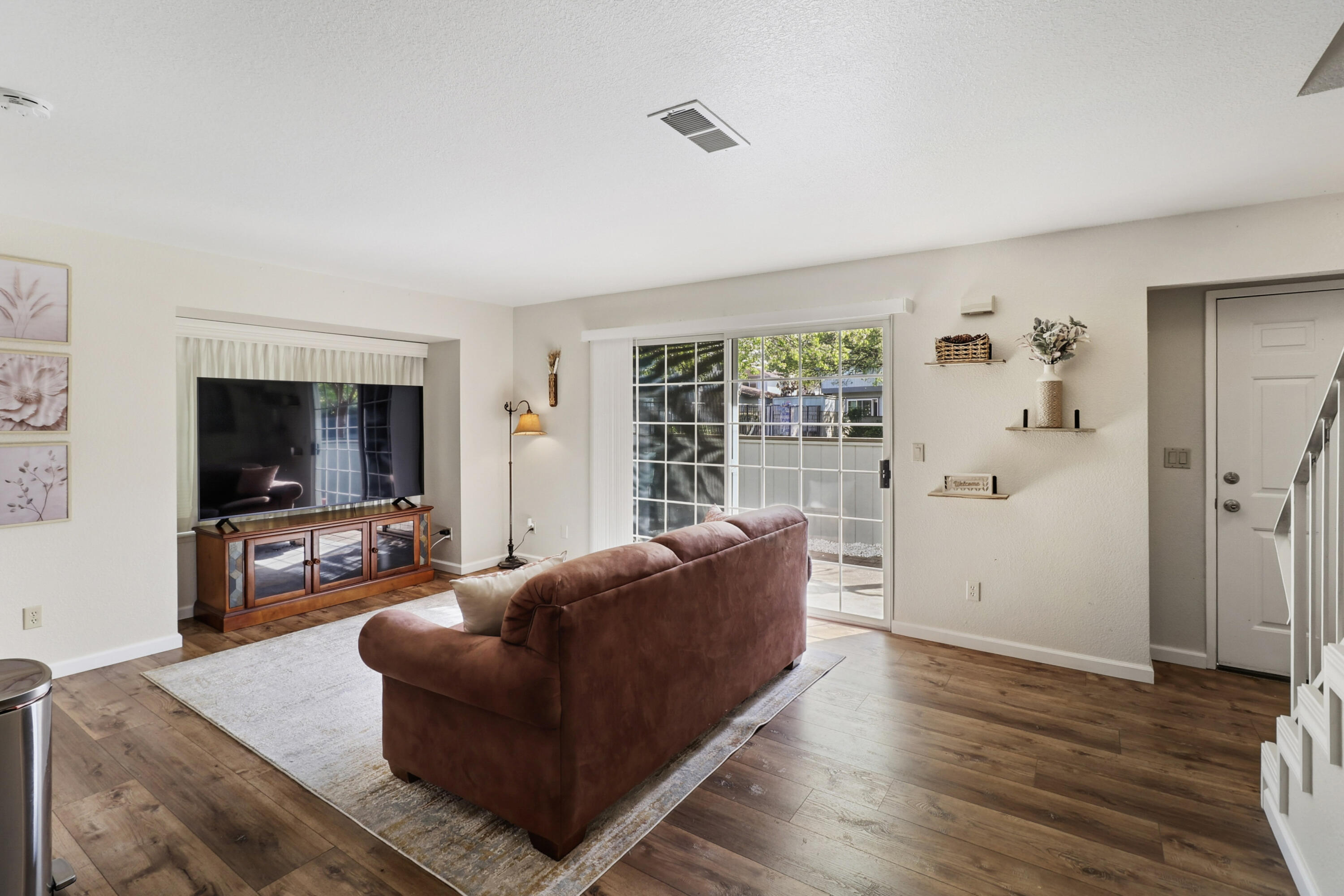 200 Ridgetop Drive, Unit 31 Redding, CA 96003 - Photo 4 of 34 a living room with furniture and a flat screen tv