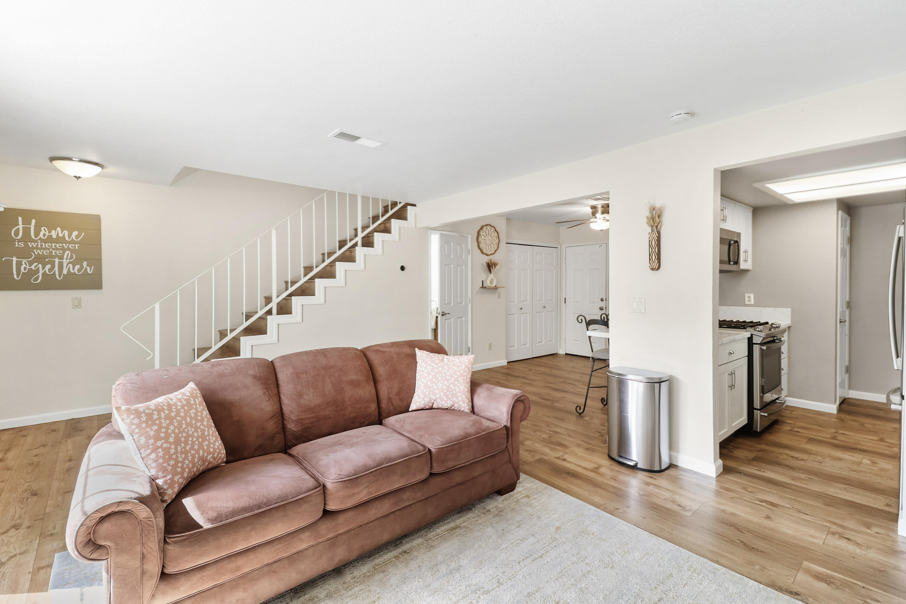 200 Ridgetop Drive, Unit 31 Redding, CA 96003 - Photo 5 of 34 a living room with furniture and a wooden floor