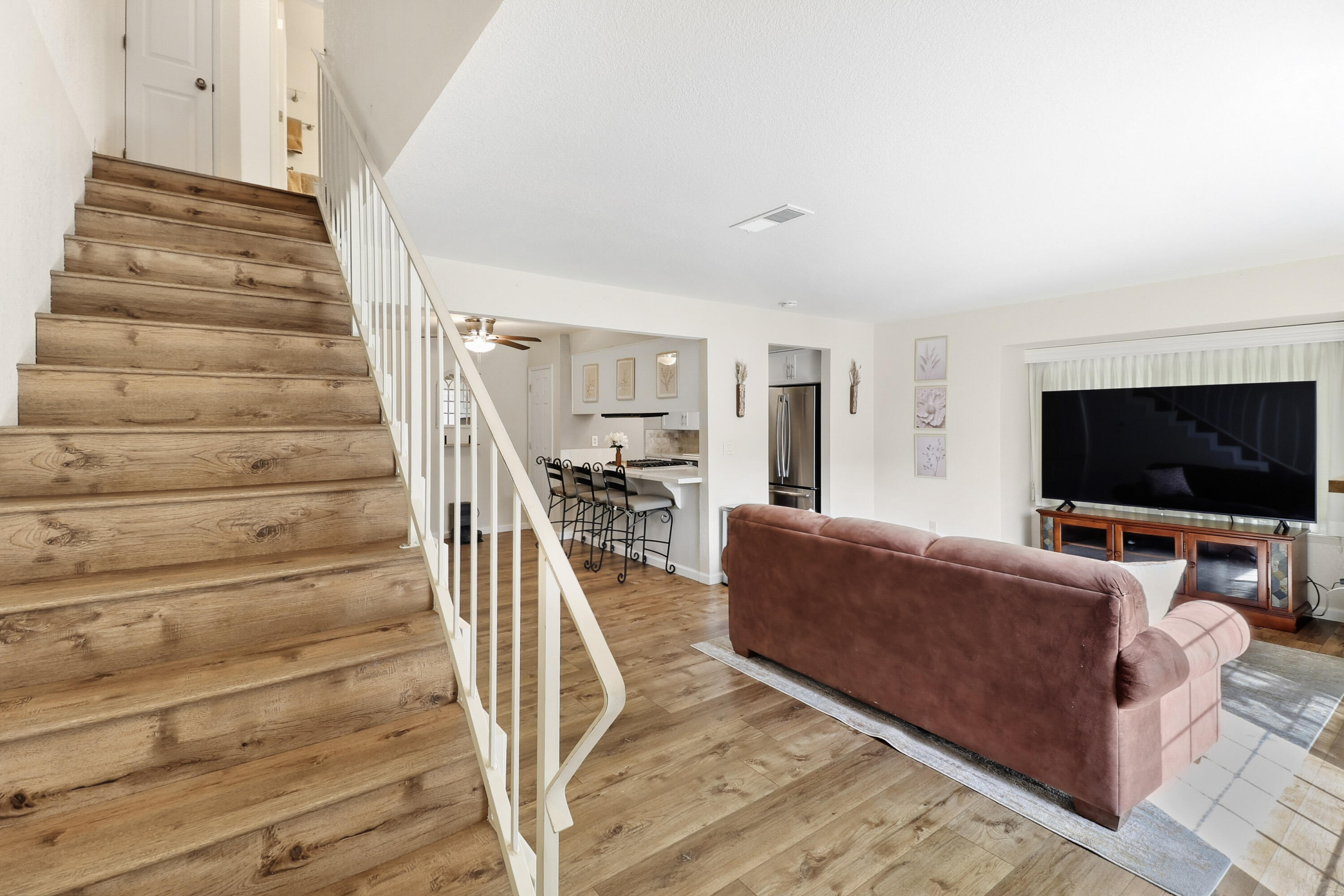 200 Ridgetop Drive, Unit 31 Redding, CA 96003 - Photo 6 of 34 a living room with furniture and a flat screen tv