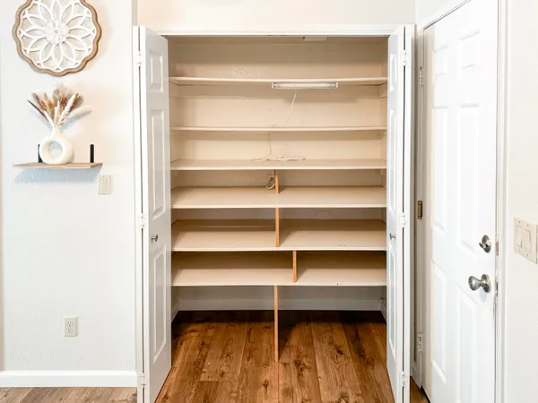 a view of a room with rack on the wall