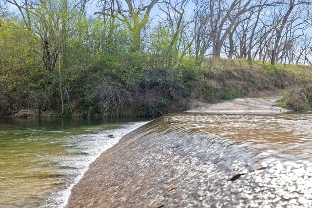 a view of lake with mountain